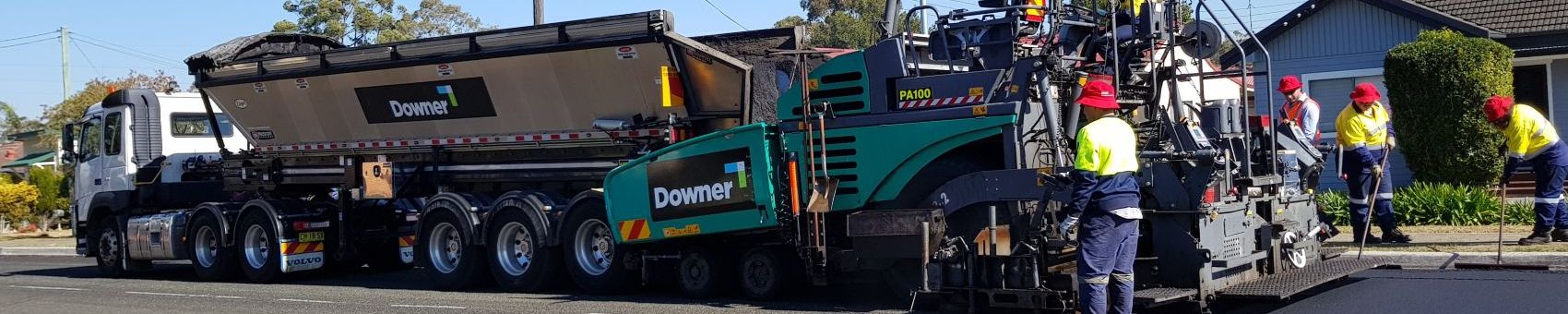 Reconophalt, a highly recycled road surface material being applied to surface.
